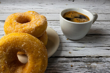 cup of coffee and donuts