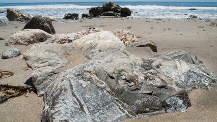 Arroyo Burro Beach, Santa Barbara, features rocks in the sand