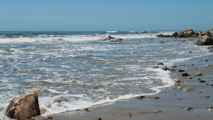 Arroyo Burro Beach, Santa Barbara, features rocks in the sand