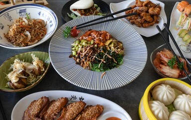 Top view of various Asian dishes on the table