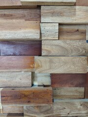 Randomly Stacked 3D Wood Paneling on Wall