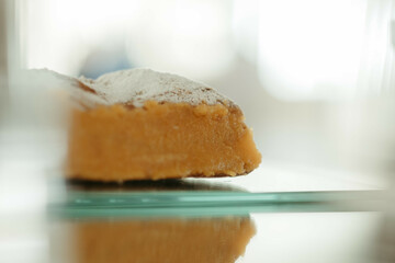 a pastry that is sitting on top of a glass plate