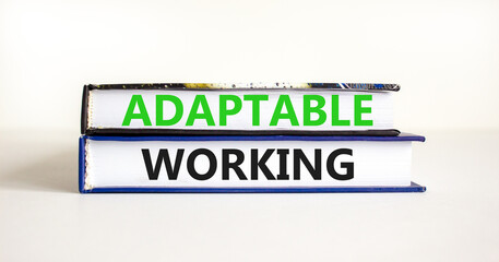 Adaptable working symbol. Concept words Adaptable working on beautiful books. Beautiful white paper background. Business Adaptable working concept. Copy space.