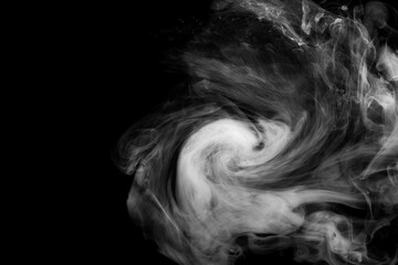 White ink dropped in to water isolated black background. Abstract white color dissolving in water