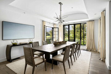Spacious dining room with a sophisticated, classic design