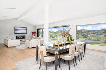 Luxury home features a spacious dining room with stunning views