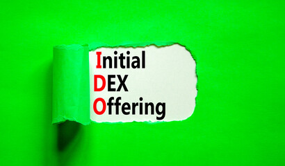 IDO initial DEX offering symbol. Concept words IDO initial DEX offering on beautiful white paper. Beautiful green paper background. Business IDO initial DEX offering concept. Copy space.
