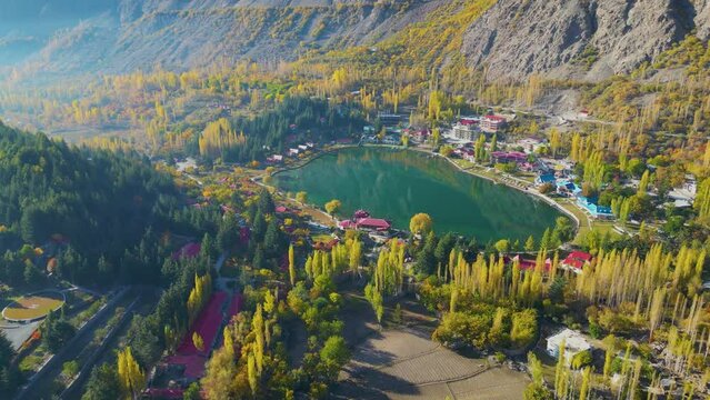 Aerial View Over  Calm Reflective Lower Kachura Lake, also known as Shangrila Lake Near Skardu In Gilgit&minus;Baltistan, Pakistan. Push Forward Shot