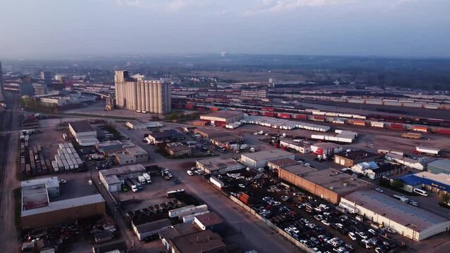 Aerial drone shot of Calgary's industrial area with the Canada Malting Co. Limited facility in the background.