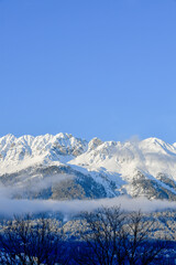 The mountains of the Nordkette surround Innsbruck in Tyrol with the summit Hafelekar