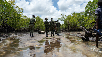 Group of military personnel in Mocimboa da Praia, located in the Cabo Delgado region © Wirestock