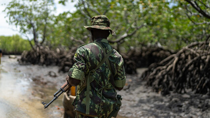 Male member of the military forces in Mocimboa da Praia, located in the Cabo Delgado region