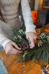Crafting session teaching how to make Christmas wreaths and New Year's decor.