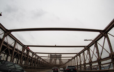 view from the front seat of a car while driving across a bridge