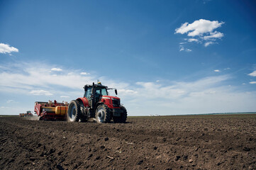 Driving on the field. Agricultural machinery, tractor. Conception of harvest