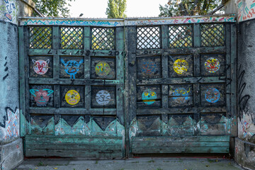 Vintage wooden entrance door with an aged appearance
