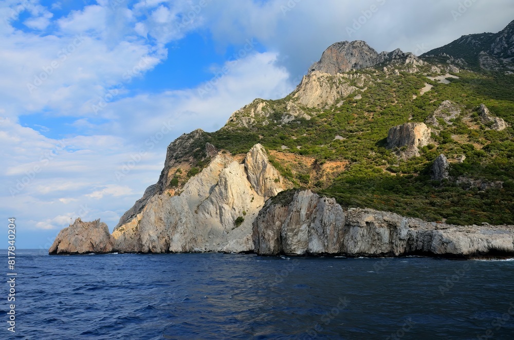 Wall mural serene day on the shoreline of mount athos in greece