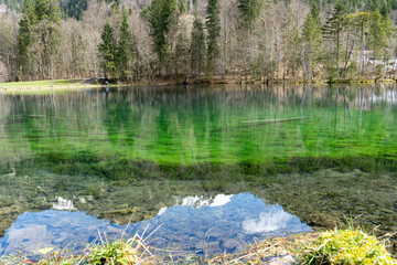 Obraz premium Amazing colored and crystal clear with reflections Christlessee near Oberstdorf