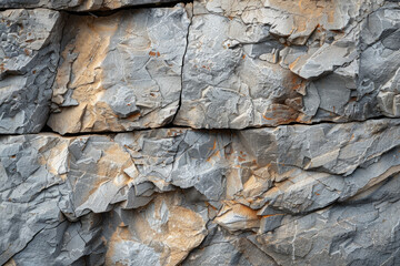 A close-up of a piece of rough-hewn stone, showcasing its natural texture and rugged beauty.