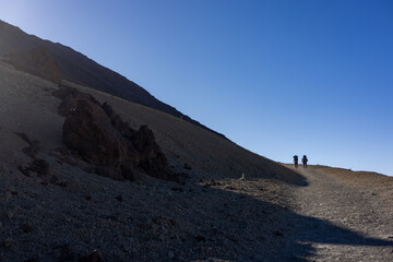 a couple of hikers on a path