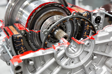 Hybrid traction head with clutch electric motor auto transmissio