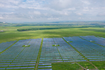 Aerial photography of photovoltaic power generation in the grassland of Huolingol City, Tongliao...