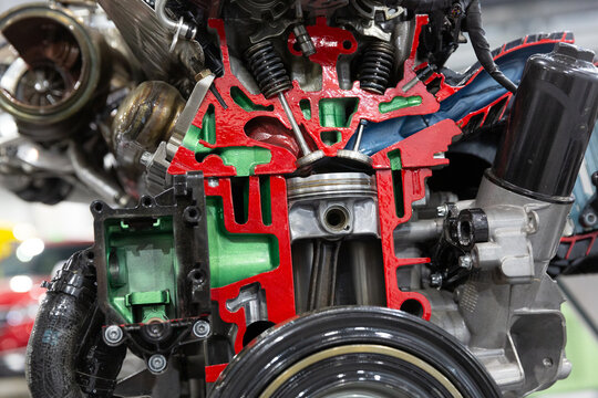 Close up of a car engine cylinder  in section as an educational sample of an internal combustion engine.