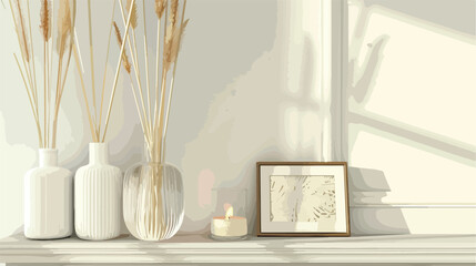 Stylish pictures and reed diffuser on mantelpiece