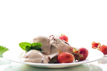 fresh organic cottage cheese with strawberries and ice cream in a plate