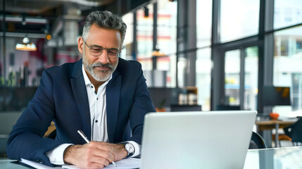 It's a business professional working in a modern and sophisticated office