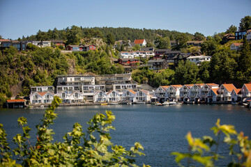Children, family, visiting small village Flekkefjord during summer vacation