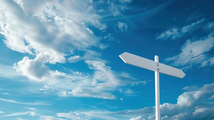 Signpost under blue sky with fluffy clouds