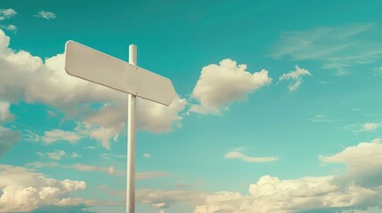 Blank signpost against a cloudy sky