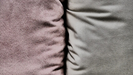 Close-up of two different pillows placed close to each other