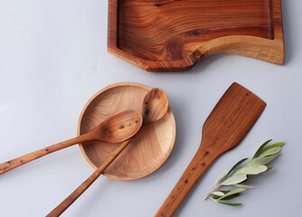 Wooden kitchen utensils stacked view, spoon and spatula