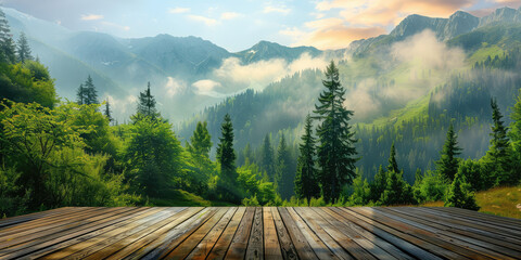 View from the empty wooden terrace over the mountains and forest in summer morning fog. Nature relax wallpaper.