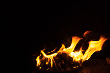 Fire texture on a black background. The fire pattern at night has its own impression.