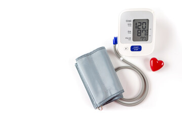 tonometer and red heart on a white background with copy space.