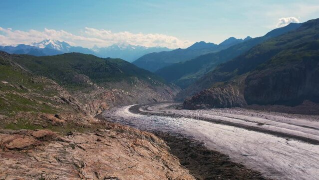 Aerial drone view of Great Aletsch Glacier Alps Switzerland in sunny summer day. Popular tourist destination