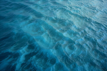 Calm rippling water with varying shades of blue, capturing the peaceful essence of a water surface