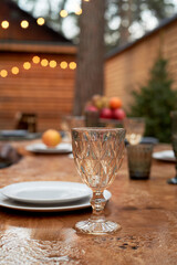 Covered table on the terrace. A table wet from the rain. The atmosphere in the restaurant