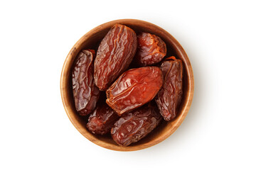 Dried dates in wooden bowl on white background