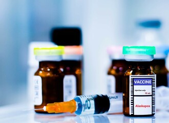 Vaccine bottles and syringes for preventing alaskapox virus.