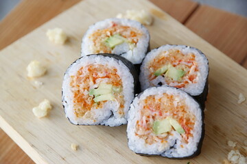 sushi on a white plate Salmon steak: smoked salmon: salmon sushi