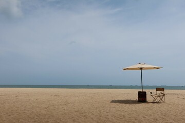 beach umbrella and chairs