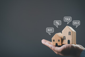 house or building or land value property tax, local development tax concept. Word tax, home model...