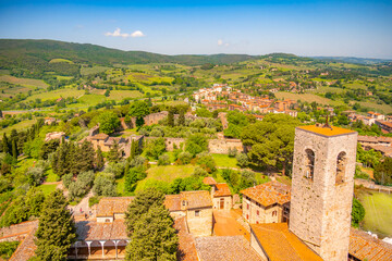 Medieval San Gimignano hill town with skyline of medieval towers, including the stone Torre Grossa. Province of Siena, Tuscany, Italy.