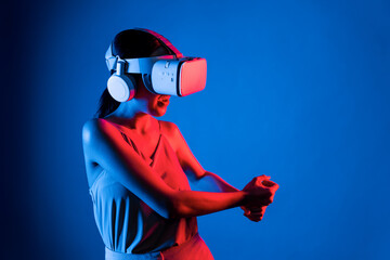 Smart female stand wear VR headset connecting metaverse, future cyberspace community technology....