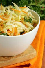 cabbage salad, coleslaw with herbs on the table