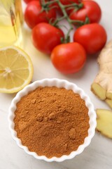 Different fresh ingredients for marinade on white wooden table, above view